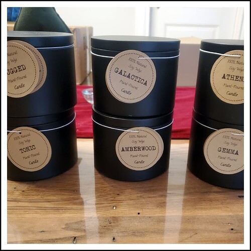25 large black tin candles