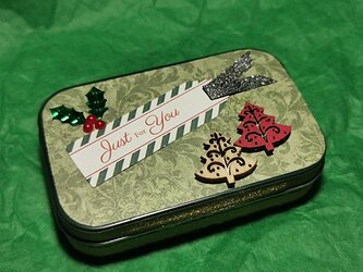 a DADA Christmas tin 1